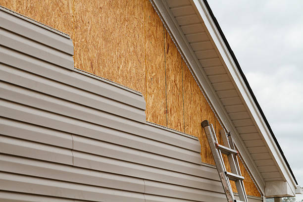 Professional Siding Repair technician working in North Olmsted, OH